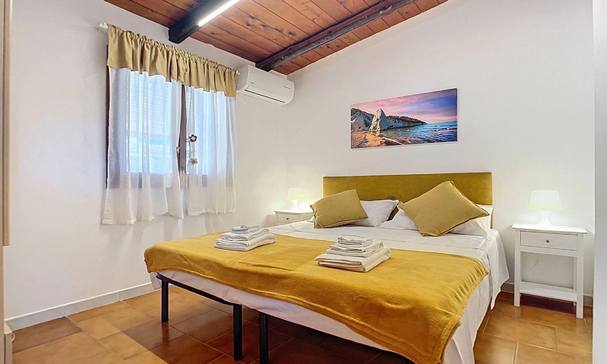 Montincello Apartment | Apartment 'La Mignola - Bilo 2 - Duplicate' with Shared Garden, Wi-Fi and Air Conditioning