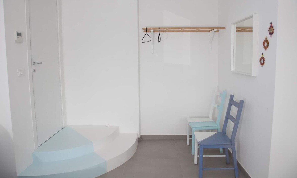 Fuorigrotta Apartment | Blue apartment with double bedroom and living room / kitchen with sofa bed and private bathroom