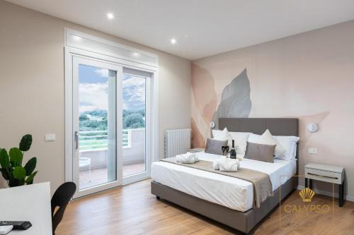 Quartiere XXXV Lido di Castel Fusano Apartment | Calypso apartment - Seaview, pvt terrace, luxury design, A-C