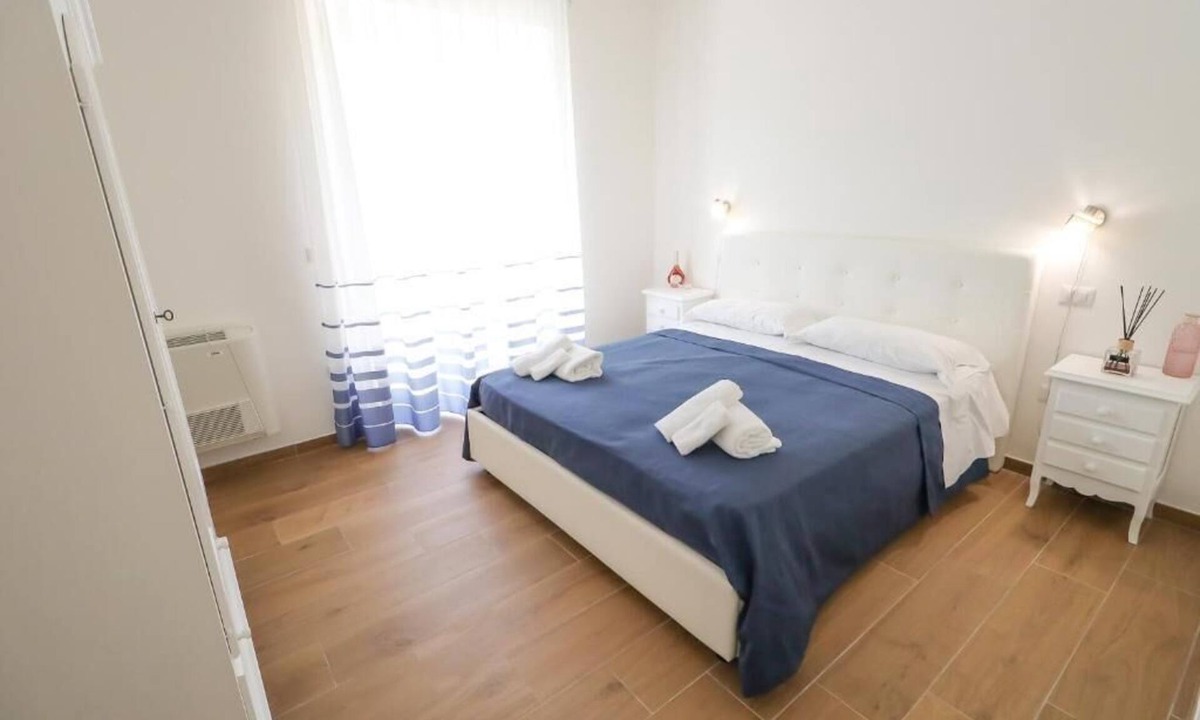 Laureana Cilento Apartment | Double bed and sofa bed
