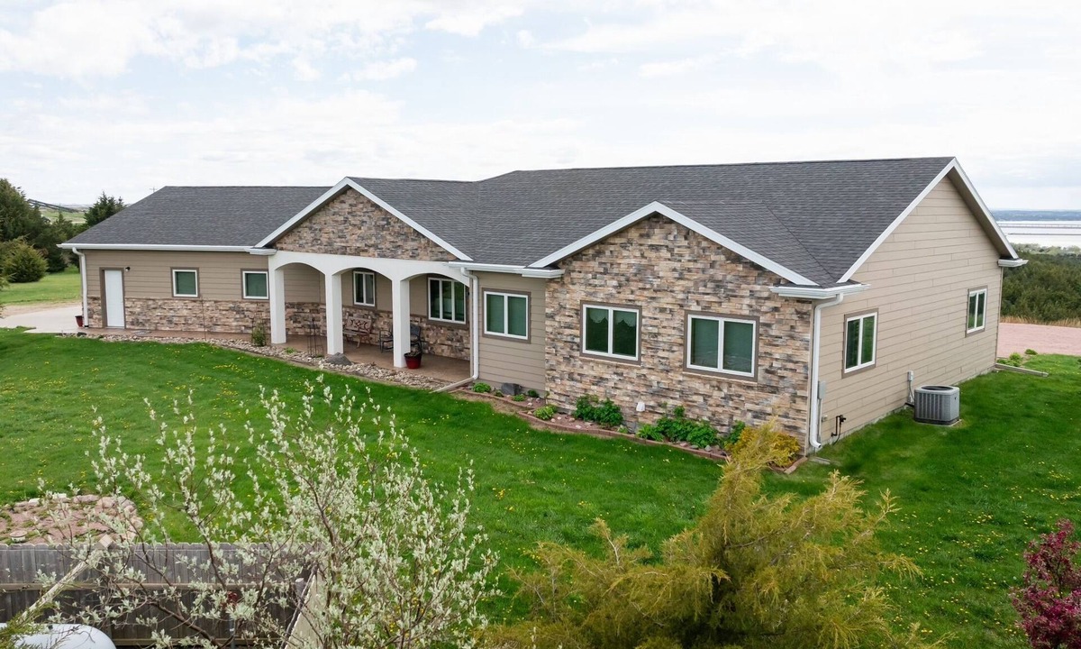 Chamberlain House | Location Location Location! On a river view acreage, sleeps up to 14, pets ok.