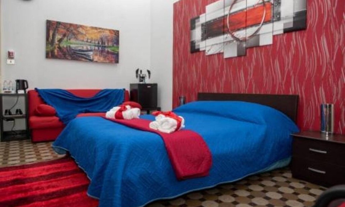 Taranto House | PITAGORA HOUSE, 3 bedrooms, bathroom, TV and dining room, cooking area, veranda