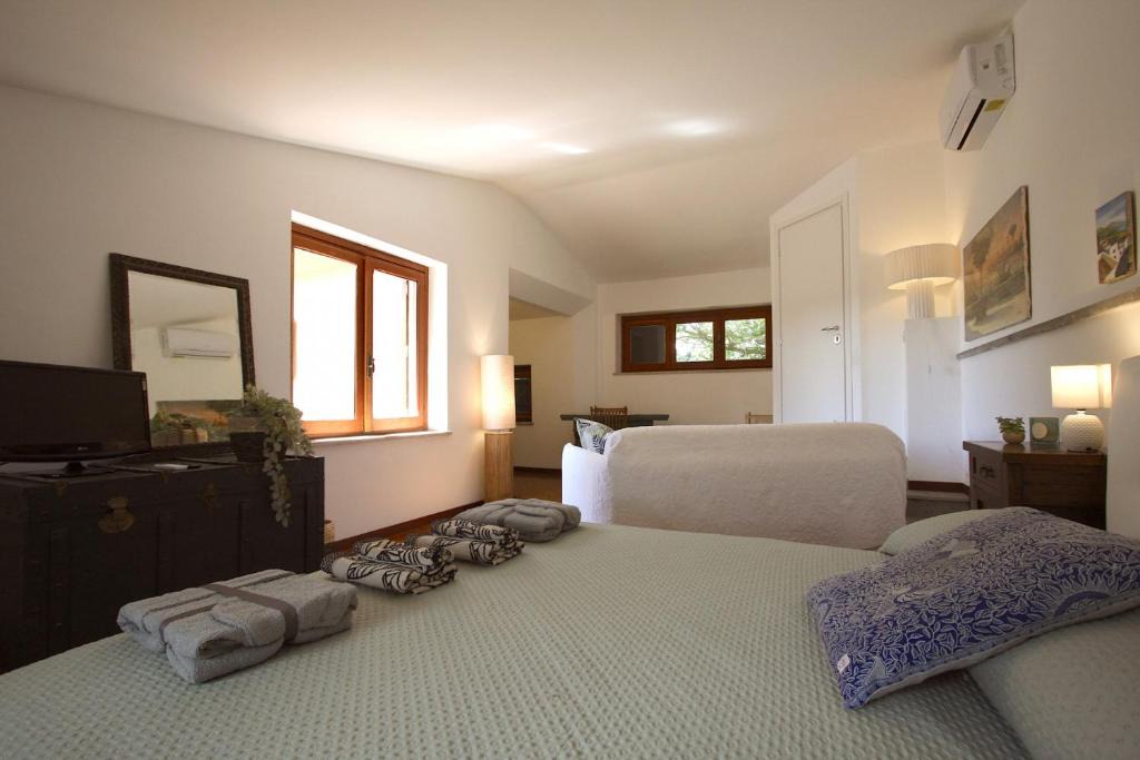 Ara Nova Apartment | Stanza dell'Ulivo
