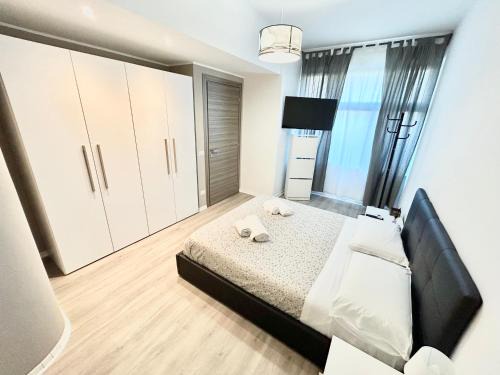 Quartiere XX Ardeatino House | Un Letto Ideale EUR - UN LETTO IDEALE