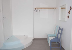 Blue apartment with double bedroom and living room / kitchen with sofa bed and private bathroom