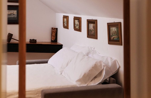 Montecalvario Apartment | Attico Ventaglieri by Wonderful Italy