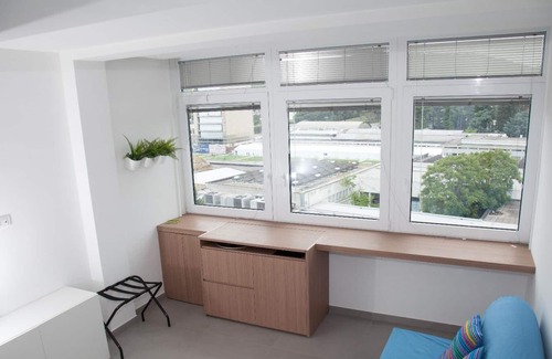 Fuorigrotta Apartment | Blue apartment with double bedroom and living room / kitchen with sofa bed and private bathroom