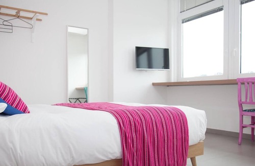 Fuorigrotta Apartment | Rosa apartment with double bedroom and living room / kitchen with sofa bed and private bathroom