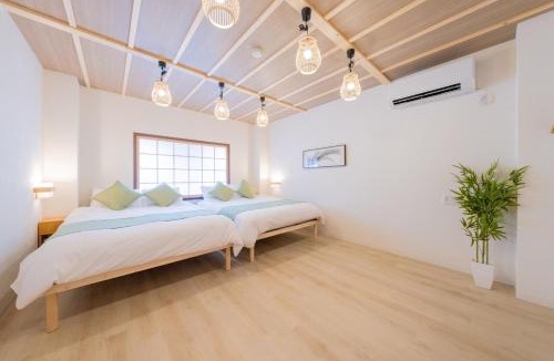 Higashinari Villa | 澤 寝室4つの広い一軒家 寝具9点 お風呂2台 トイレ3台 駅徒歩5分 コリアンタウンや道頓堀近く