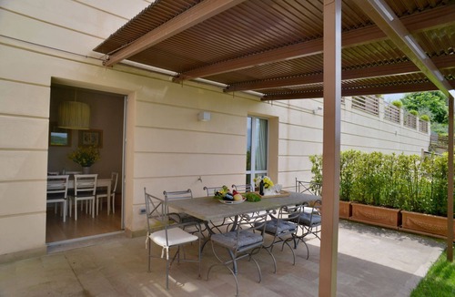 San Casciano dei Bagni Apartment | 1800 square feet, 2 bedrooms, 2 bathrooms, kitchen and living, garden with patio