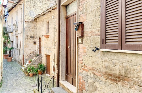 Grotte di Castro Apartment | A historical vacation with active destinations nearby.