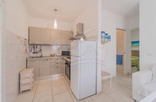 Marina di Campo Apartment | Albero del Pepe 2 with lush garden