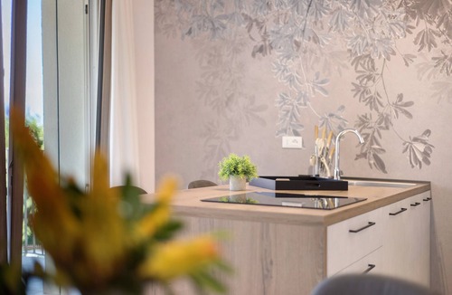 Garda Apartment | Apartment 'Eleonora C3' with Shared Pool, Private Terrace, and Air Conditioning