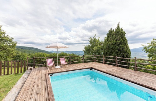 Chianciano Terme Apartment | Apartment 'La Loggia' with Mountain View, Shared Pool and Wi-Fi