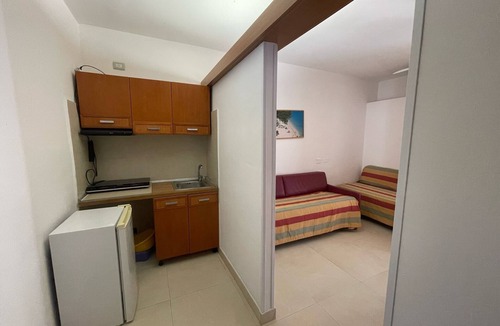 Peschici Apartment | Apartment 'Maritalia 1' with Private Terrace, Private Garden and Air Conditioning