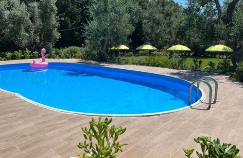 Montincello Apartment | Apartment 'Quadrupla - Villa Terra Nostra' with Shared Pool, Wi-Fi and Air Conditioning