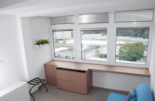 Fuorigrotta Apartment | Blue apartment with double bedroom and living room / kitchen with sofa bed and private bathroom
