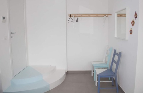 Fuorigrotta Apartment | Blue apartment with double bedroom and living room / kitchen with sofa bed and private bathroom