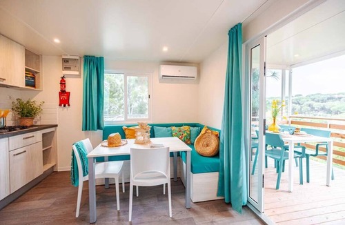 Magazzini House | Camping Village Rosselba Le Palme Mobilehome Comfort for 4 persons