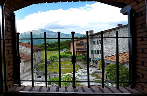 Ponte nelle Alpi Cottage | Cottage in Italy with Alpine Fireplace