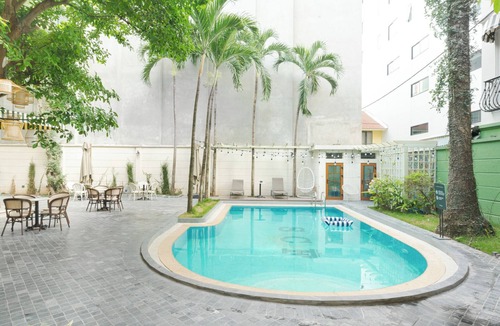 Ba Dinh House | Éclectique is a home layered with stories, culture, and quiet beauty.