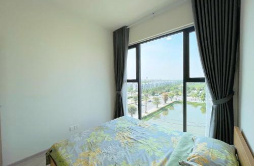 District 9 Apartment | Green Lumiere 2BR Apartment, peaceful sunset view