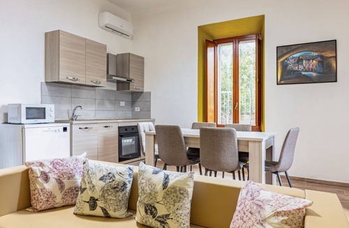 Perugia Apartment | GuestHost - Cozy apartment equipped with all comforts to accommodate 4 people, with 2 bedrooms, 2 bathrooms and private garden. Located in an elegant period building in Art Nouveau style, it is outside the restricted traffic zone, but just a 10-minute wa