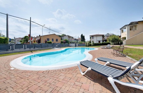 Desenzano del Garda Apartment | Holiday Apartment 'Katy Lake Salvia' with Shared Pool, Private Terrace & Wi-Fi