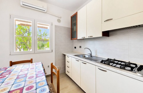 Chiesiola House | Holiday Home 'Trilocale' with Private Terrace, Shared Garden and Air Conditioning