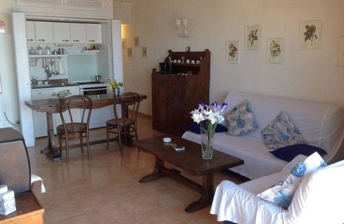 Cala Piccola Apartment | House with large terrace overlooking the sea, swimming pool, solarium, bathing establishment.