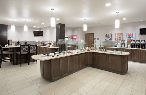 Rapid City Apartment | King Suite. Free Breakfast. Pool & Hot Tub. Great for Business Travelers!
