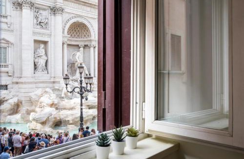 Rione II Trevi Apartment | Luxury Suite with Direct Trevi Fountain View Romantic Stay