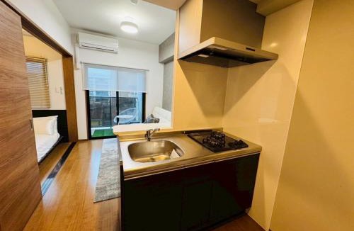 Hakata-ku Apartment | LuxurySweet博多駅南61 最大3,4人 博多駅車で5分 新築 条件付ペット宿泊可
