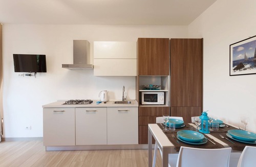 Cassone Apartment | Modern Apartment "Gennaker" On Lakeside with Terrace and View