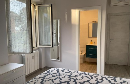 Quartiere XXVIII Monte Sacro Alto Apartment | Moderno 85mq con 2 bagni e posto auto nel cortile interno