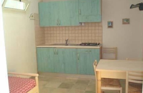 Defensola House | Orchid holiday flat with covered veranda