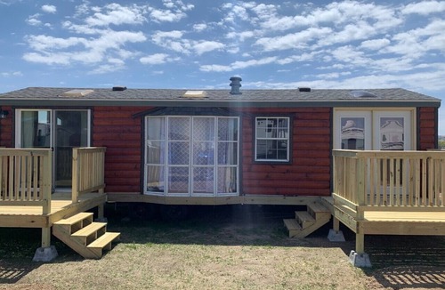 Platte RV Rental | Private Tiny Home with deck, fire pit & patio near Platte Creek Recreation area