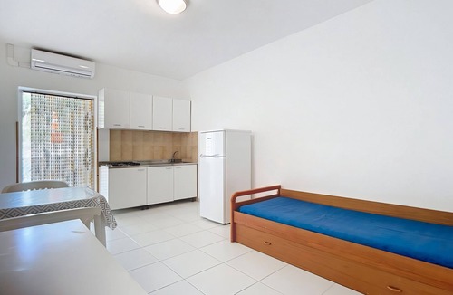 Chiesiola Resort | Property in a holiday village 'Baia Falcone - Standard 302' with sea view and air conditioning