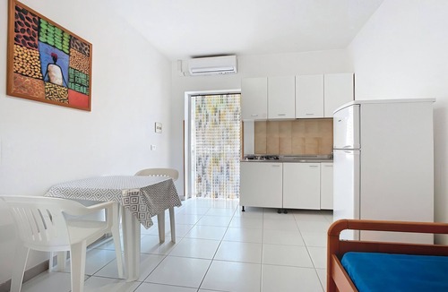 Chiesiola Resort | Property in the holiday village 'Baia Falcone - Standard 306' with sea view and air conditioning
