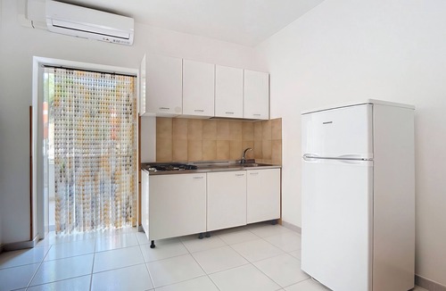 Chiesiola Resort | Property in the holiday village 'Baia Falcone - Standard 303' with sea view and air conditioning