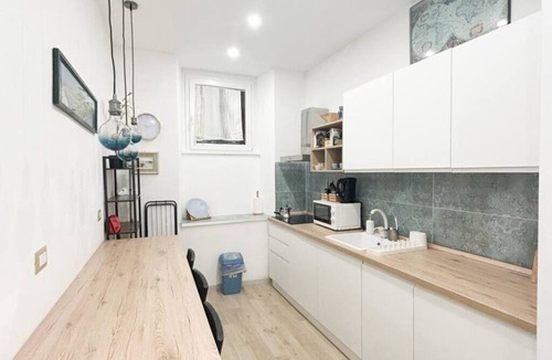 Quartiere XI Portuense Apartment | Quiet 3 bed, 3 bath apartment in the heart of Rome. 5 Minutes from the Station