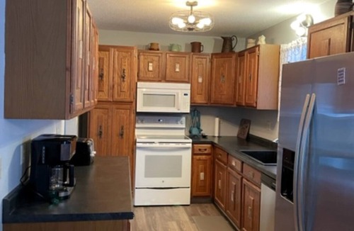 Rapid City House | Riley's Retreat Hot Tub and air conditioning!