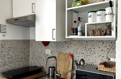 Tuscolano Apartment | Small attic with romantic terrace in the heart of Torpignattara.