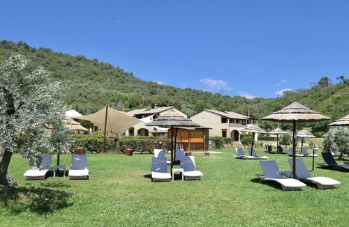 Suvereto Apartment | Spacious two-room apartments (about 45 sq m), featuring a large living room with equipped kitchenette and double sofa bed, double bedroom and bathroom with shower. Large covered first floor balcony.They are also equipped with:Bed linen and towels,dis