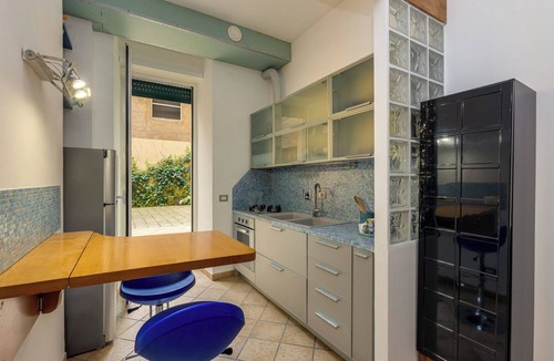 Tuscolano Apartment | The captain's cabin In style in this downtown space.