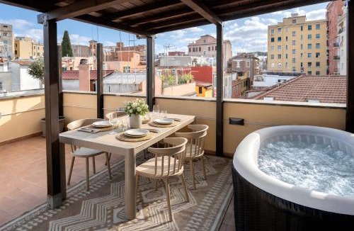 Pigneto Apartment | The Pigneto Rooftop Suite - spa e skyline view by RHR