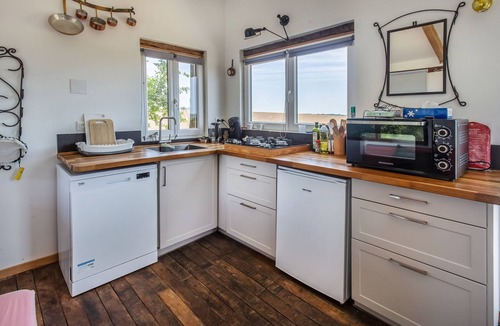 Champsac House | Tinyhouse on Bramefort Pond with Private Terrace and Nature Views