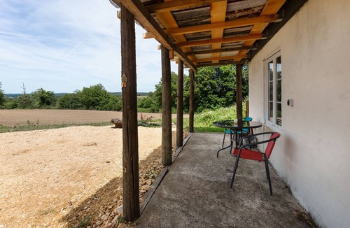 Champsac House | Tinyhouse on Bramefort Pond with Private Terrace and Nature Views