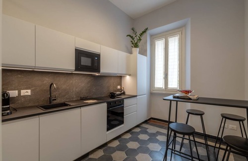 Rione XVI Ludovisi Apartment | Toscana 8 - FromHometoRome