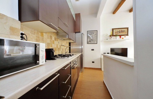 Gianicolense Apartment | Trastevere 1BR Apt With Garden by Halldis